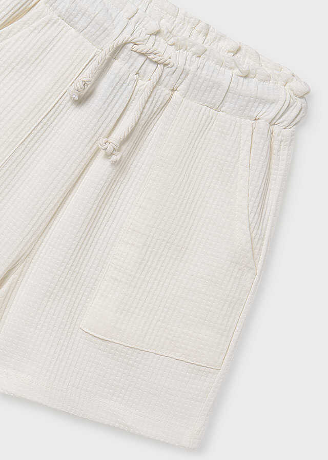Conj. Camiseta m/c cut out y Pantalon corto punto