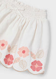 Conj. Camiseta m/c chaleco y Falda bordado