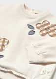 Conj. Pullover bordado y Leggings flared canale